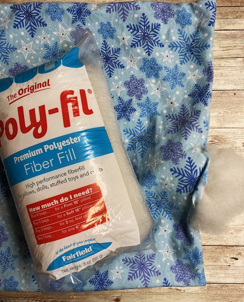 Filling Quick and Easy Snowflake Rhinestone Pillow with Poly-fil